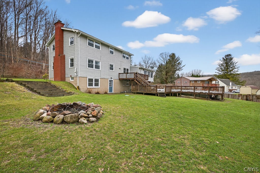 2541 Lyons Road Camillus, NY 13031 - Photo 35 of 41 Nice yard with above ground pool, deck, 3 sheds fo