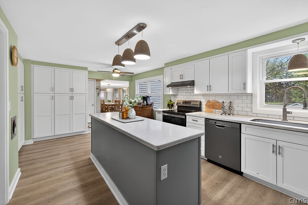 2541 Lyons Road Camillus, NY 13031 - Photo 8 of 41 This beautifully renovated kitchen has a center is