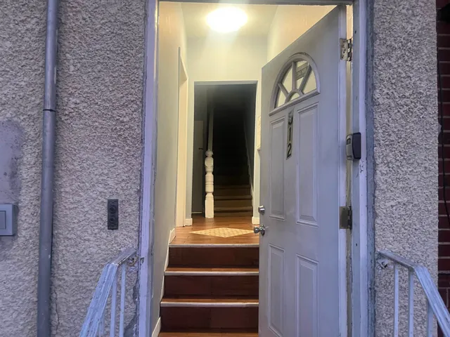 a view of a door of the house front door