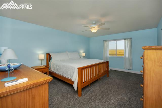 29850 Big Springs Road Calhan, CO 80808 - Photo 13 of 16 This beach inspired 13' x 17' master bedroom has been upgraded(2017) with new paint on the walls, ceiling and trim. The soft aquaua color walls and white ceiling and sunshine feels like one is on a beach or lake. It's a peaceful and soothing master bedroom fit for even the most demanding.