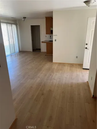 a view of a room that has a window in it