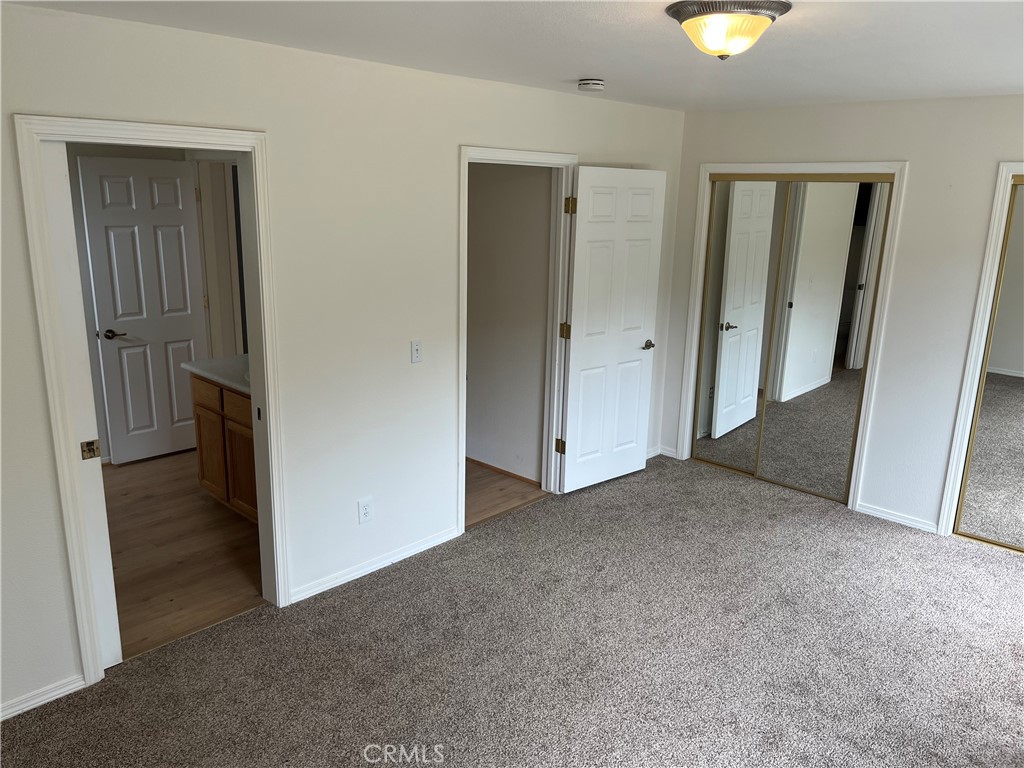 3151 Parkhill Road Santa Margarita, CA 93453 - Photo 43 of 49 an empty room with windows and closet
