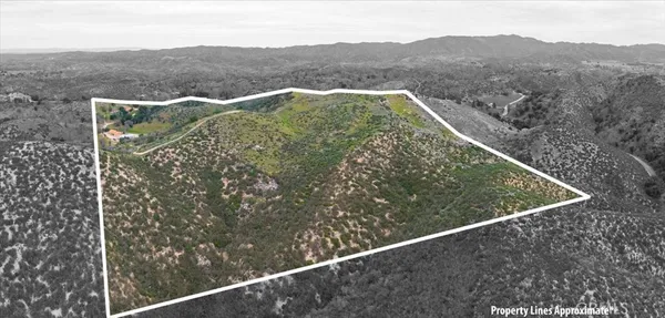 a view of a city with mountains in the background
