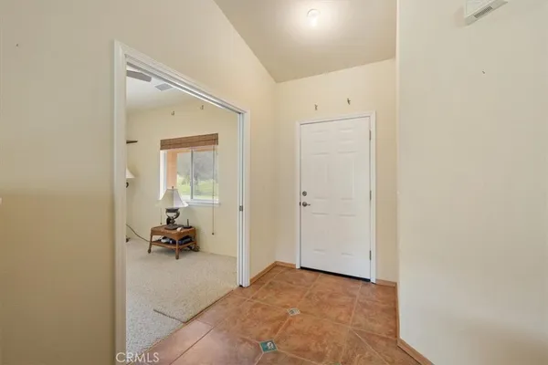 a view of a livingroom with furniture and a fireplace