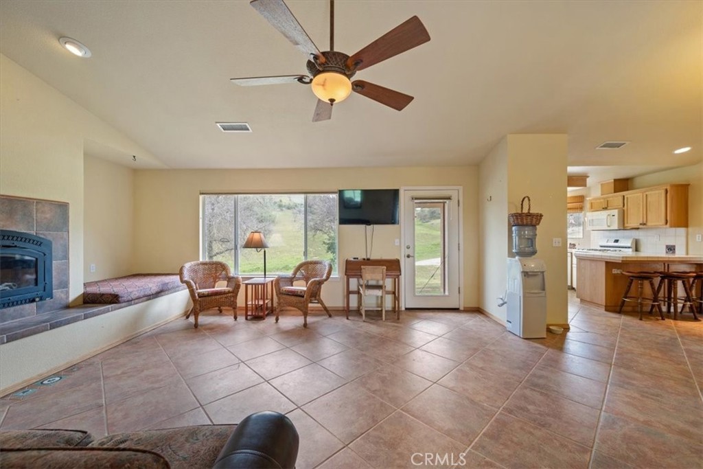 3151 Parkhill Road Santa Margarita, CA 93453 - Photo 9 of 49 a view of a livingroom with furniture and a fireplace