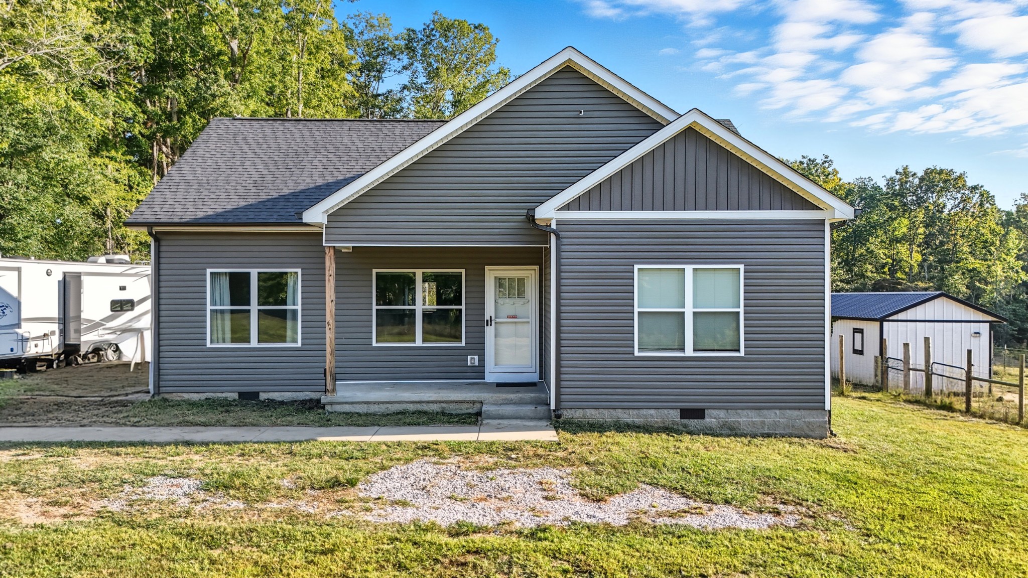 452 Pruett Road Dickson, TN 37055 - Photo 8 of 49 a view of a house with a yard
