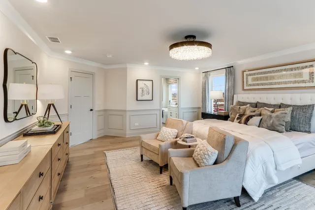 a bathroom with a sink vanity tub and a mirror