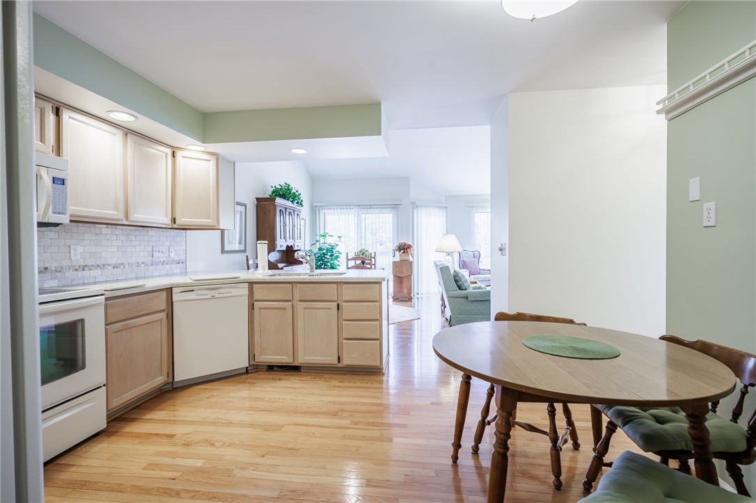 53 Waterview Circle Rochester, NY 14625 - Photo 4 of 41 Stunning kitchen with a view to water