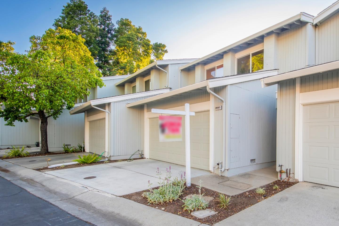 20605 Oak Creek Lane Saratoga, CA 95070 - Photo 1 of 44 a view of a street with potted plants