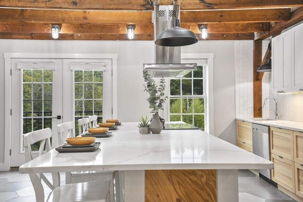 166 Littleton Road, Unit 4 Harvard, MA 01451 - Photo 6 of 31 a kitchen with a sink and a window