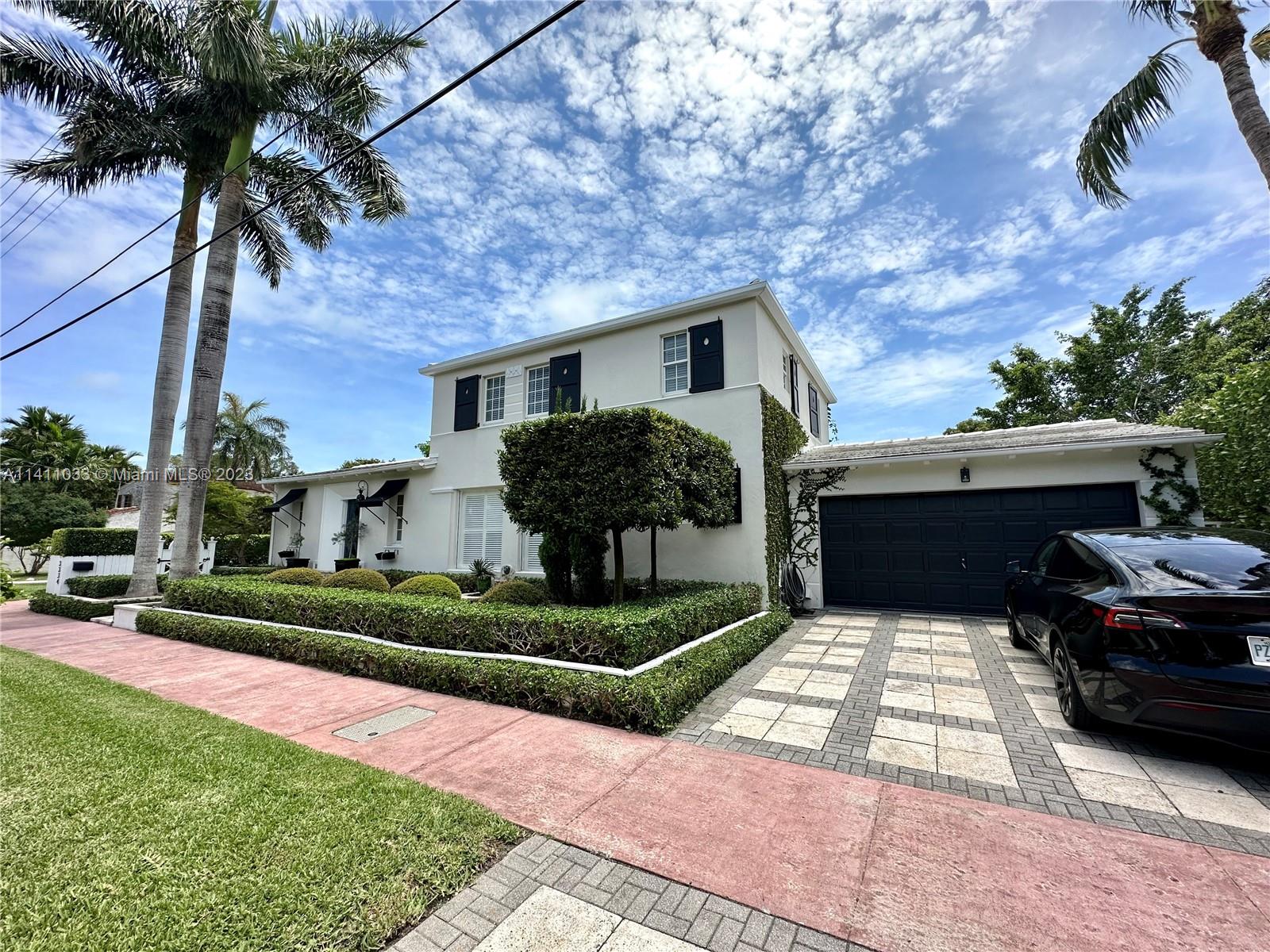 Mid Beach Miami Beach, FL 33140 - Photo 1 of 40 a house view with a garden space