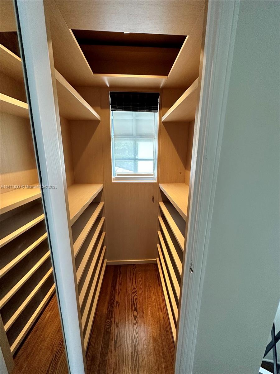 Mid Beach Miami Beach, FL 33140 - Photo 12 of 40 a view of an entryway with wooden floor