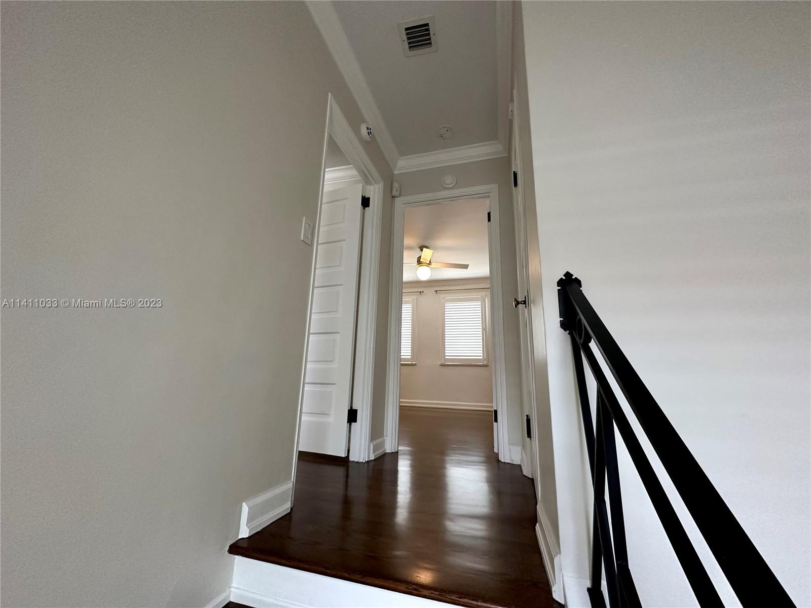 Mid Beach Miami Beach, FL 33140 - Photo 18 of 40 a view of an entryway with wooden floor