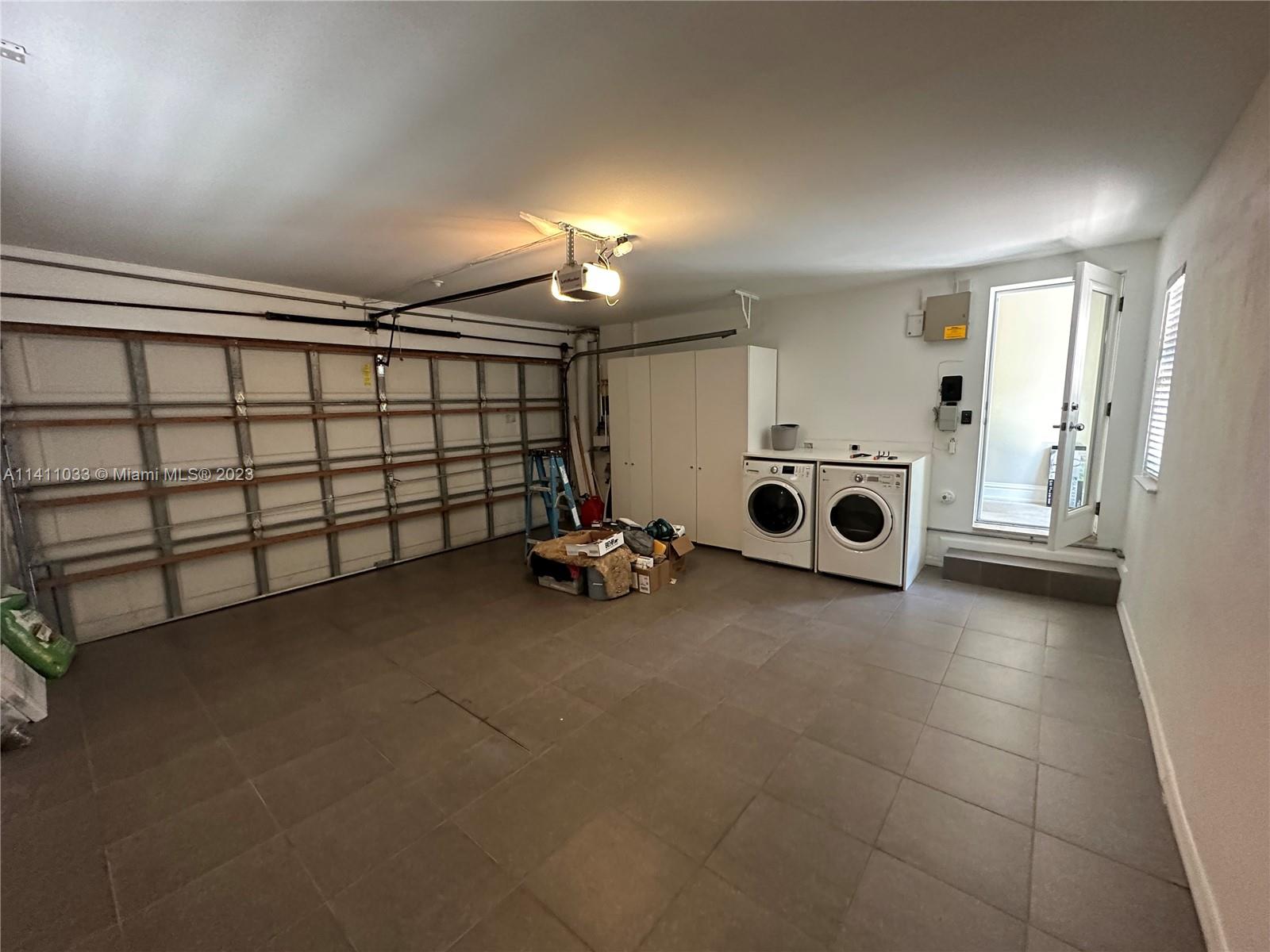 Mid Beach Miami Beach, FL 33140 - Photo 40 of 40 a view of a livingroom with furniture and a fireplace