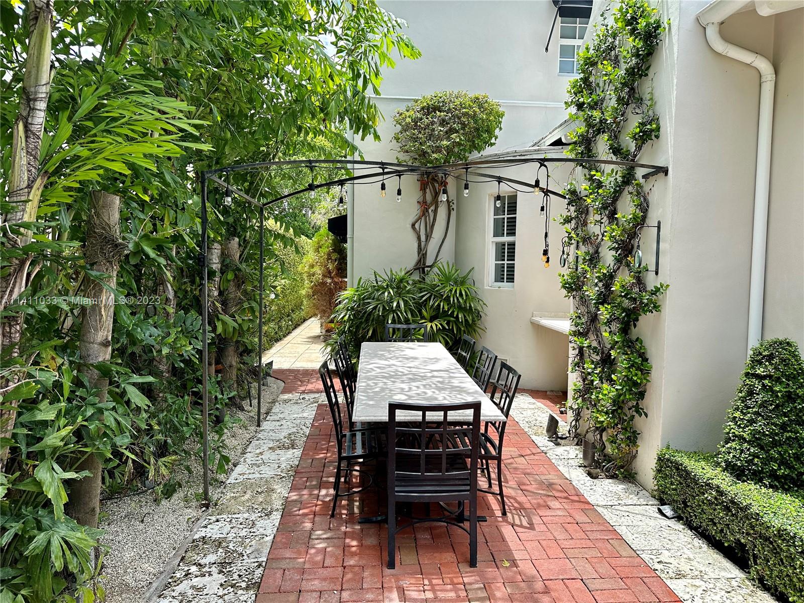 Mid Beach Miami Beach, FL 33140 - Photo 5 of 40 an outdoor space with furniture