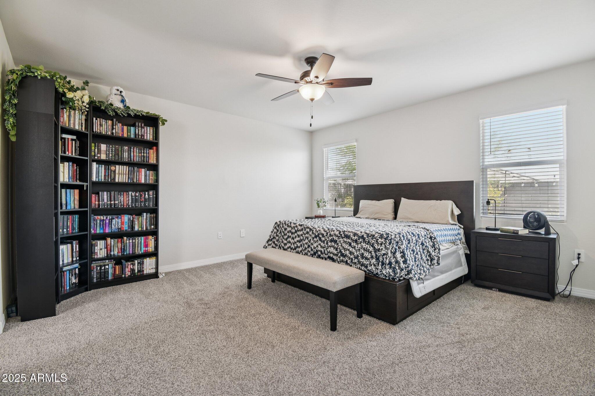 18819 West Farmer Road Buckeye, AZ 85326 - Photo 8 of 23 a bedroom with a bed furniture and decor