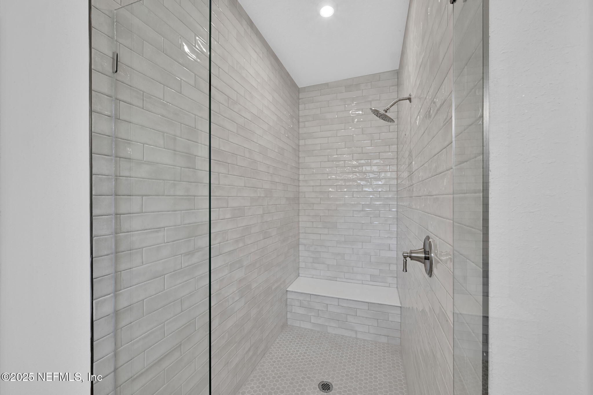 97003 Mcgirts Creek Loop Yulee, FL 32097 - Photo 25 of 40 a bathroom with a shower