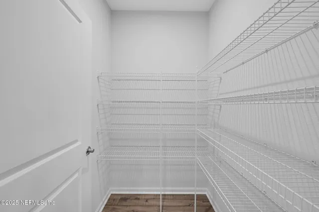 a view of small space with racks on the wall