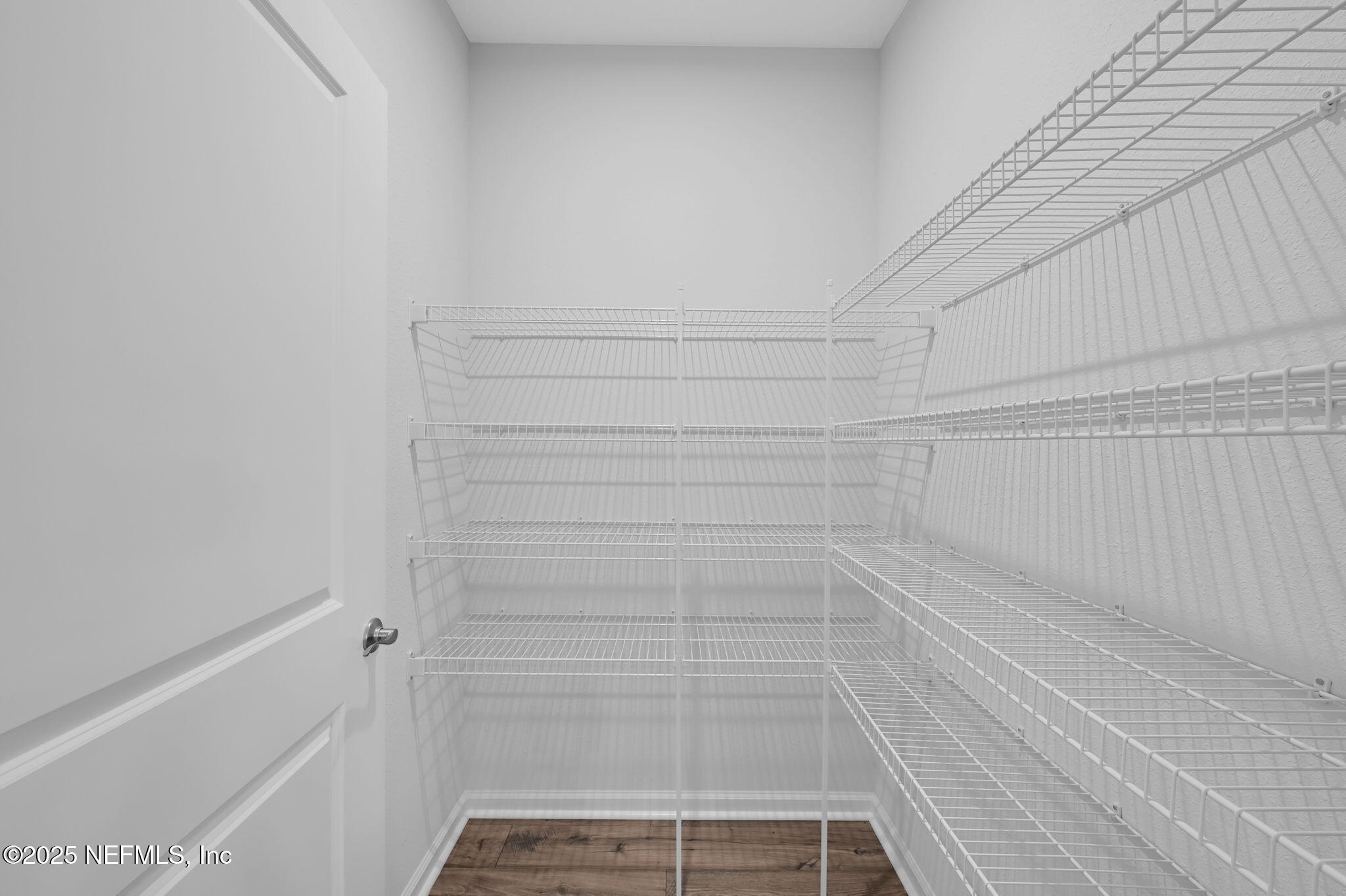 97003 Mcgirts Creek Loop Yulee, FL 32097 - Photo 33 of 40 a view of small space with racks on the wall