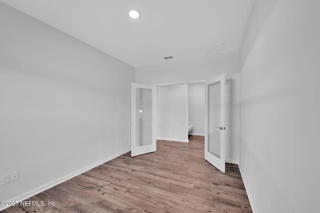 a big room with wooden floor