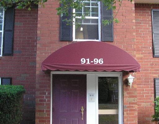91 Heather Ridge, Unit 91 Shelton, CT 06484 - Photo 1 of 1 a view of a brick building with a large door
