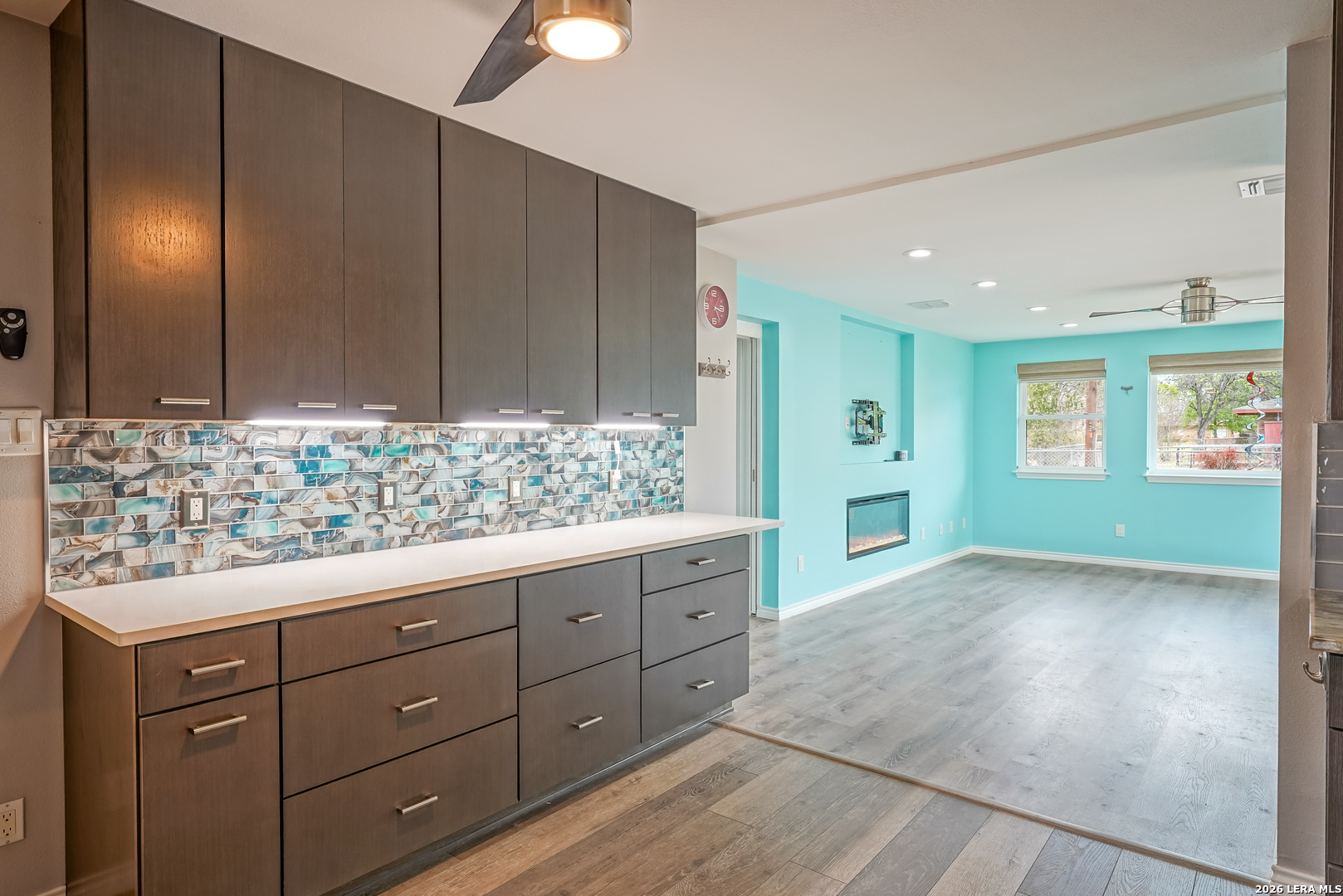 245 Windcrest Drive Windcrest, TX 78239 - Photo 14 of 50 a view of a entrance and room with wooden floor