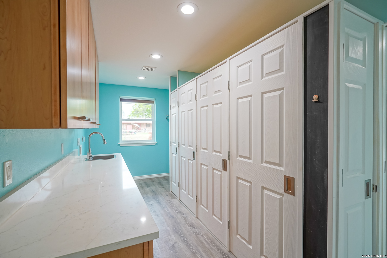245 Windcrest Drive Windcrest, TX 78239 - Photo 19 of 50 a view of a hallway with windows