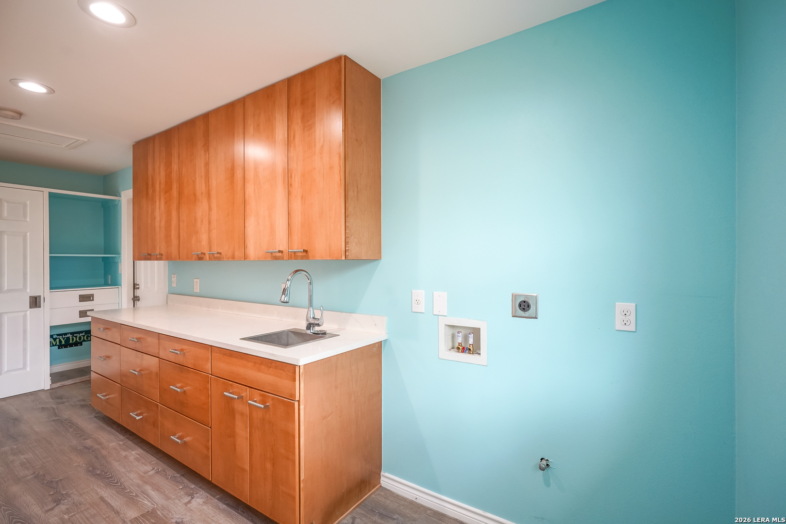 245 Windcrest Drive Windcrest, TX 78239 - Photo 22 of 50 a bathroom with a sink and a mirror