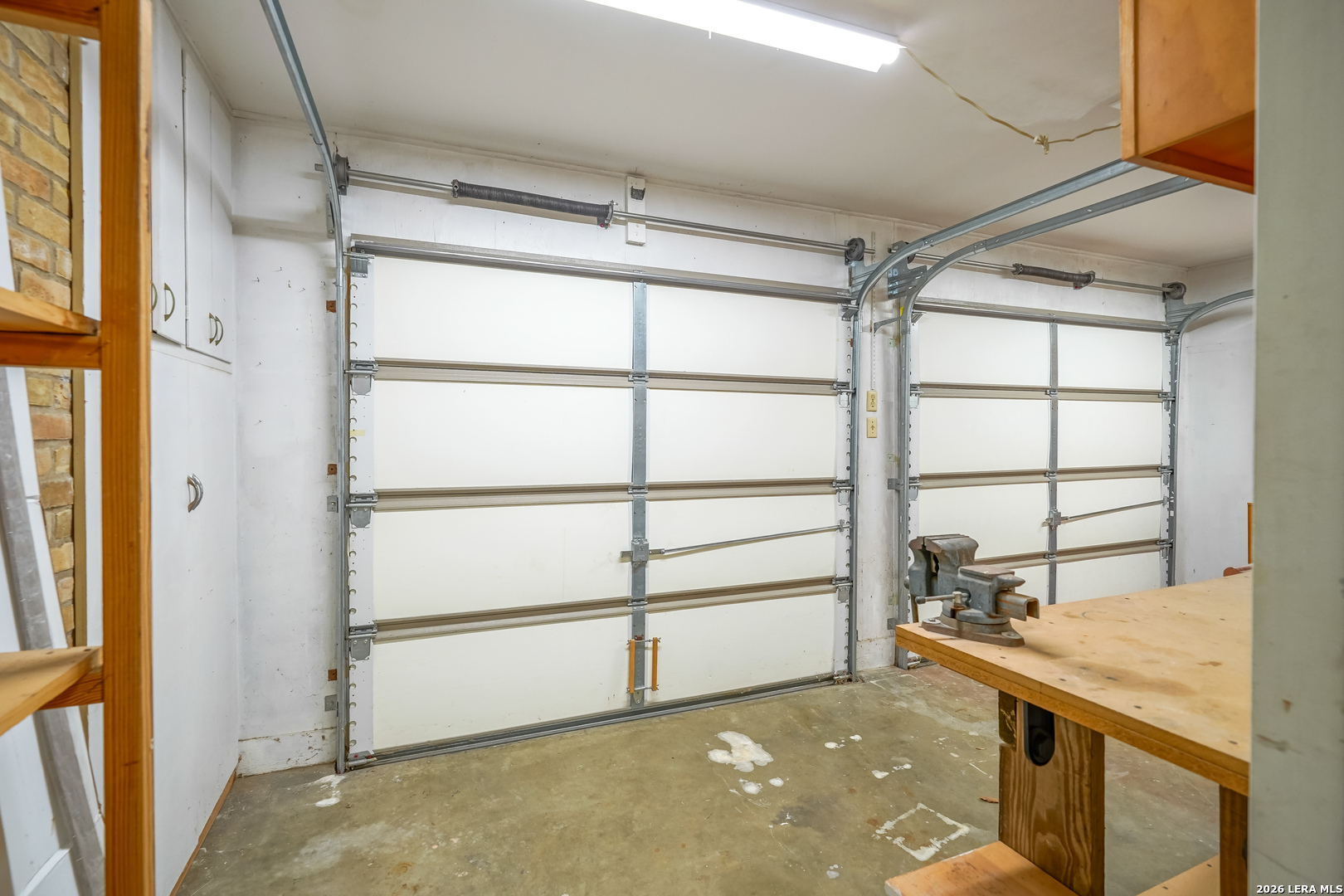 245 Windcrest Drive Windcrest, TX 78239 - Photo 32 of 50 a view of a room with racks on the wall and a window