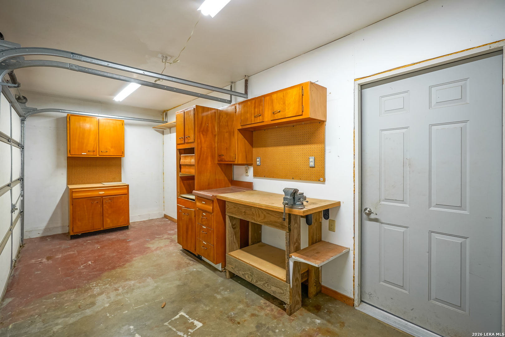 245 Windcrest Drive Windcrest, TX 78239 - Photo 33 of 50 a bathroom with a sink a vanity and a mirror