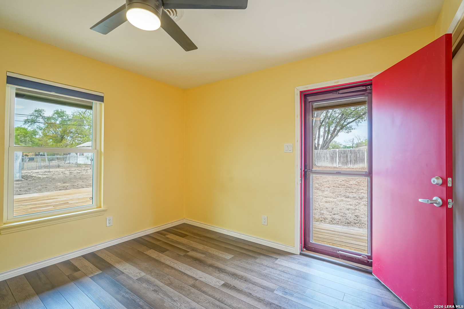 245 Windcrest Drive Windcrest, TX 78239 - Photo 41 of 50 a view of empty room with wooden floor and fan