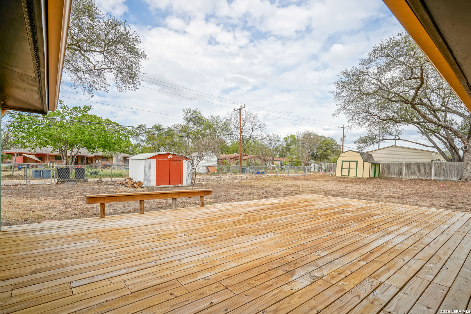 245 Windcrest Drive Windcrest, TX 78239 - Photo 46 of 50 a view of a terrace with wooden benches