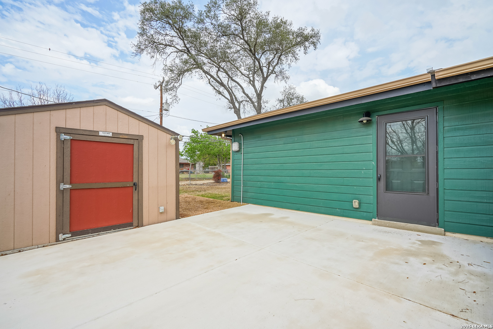245 Windcrest Drive Windcrest, TX 78239 - Photo 50 of 50 a view of a house with a backyard and garage