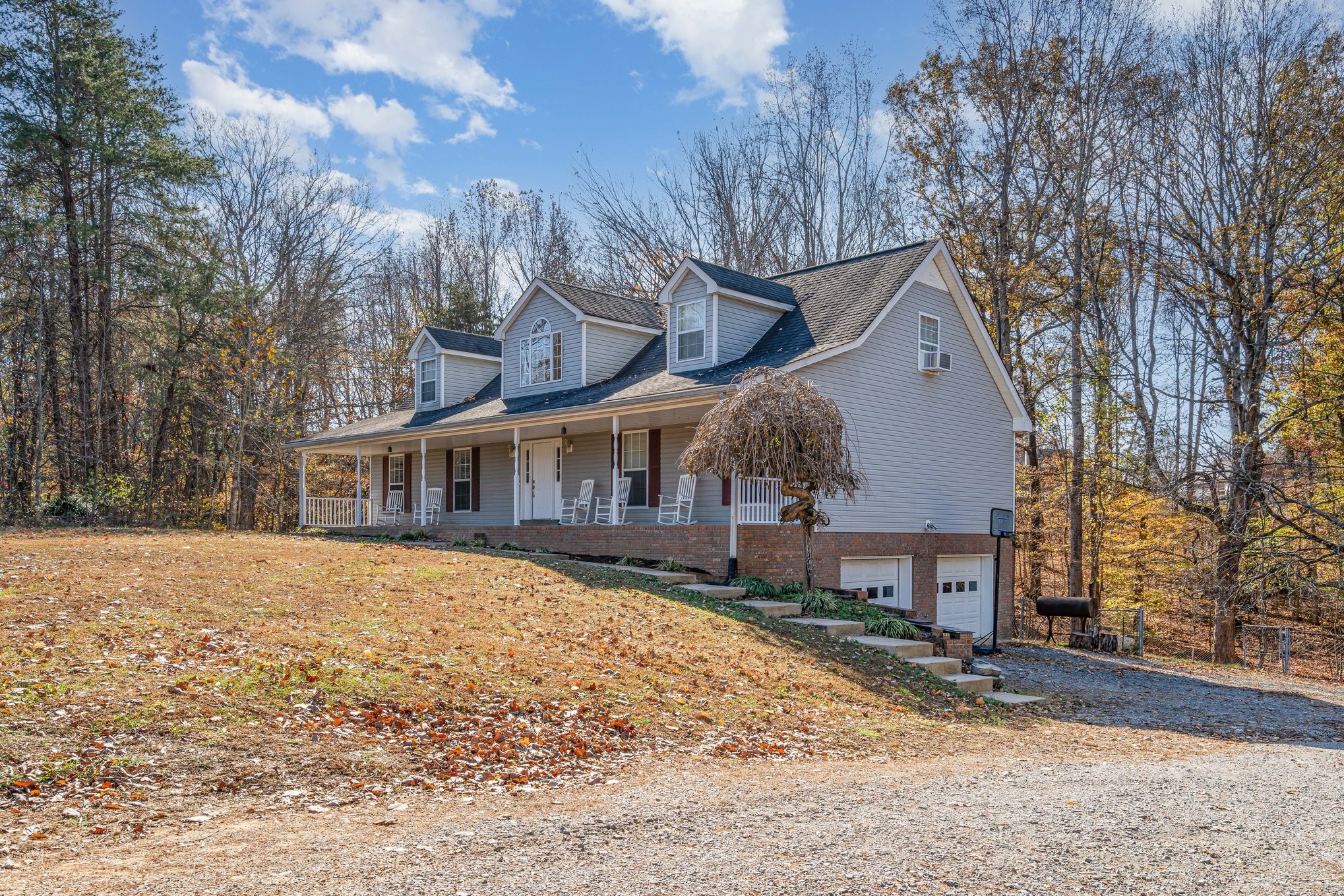 5221 Grand View Lane Pleasant View, TN 37146 - Photo 3 of 39 a view of a house with a yard covered in snow