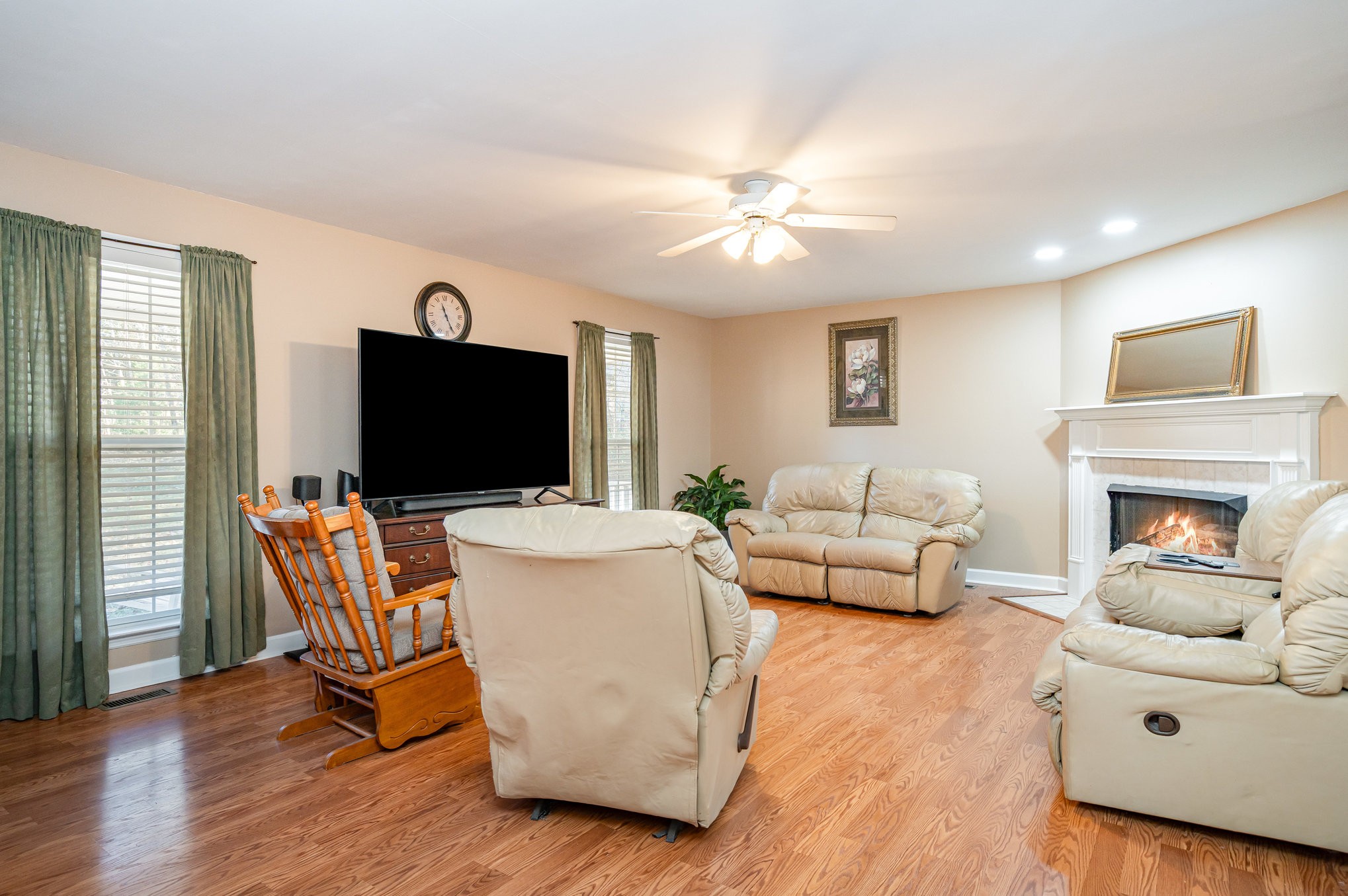 5221 Grand View Lane Pleasant View, TN 37146 - Photo 7 of 39 a living room with furniture and a flat screen tv