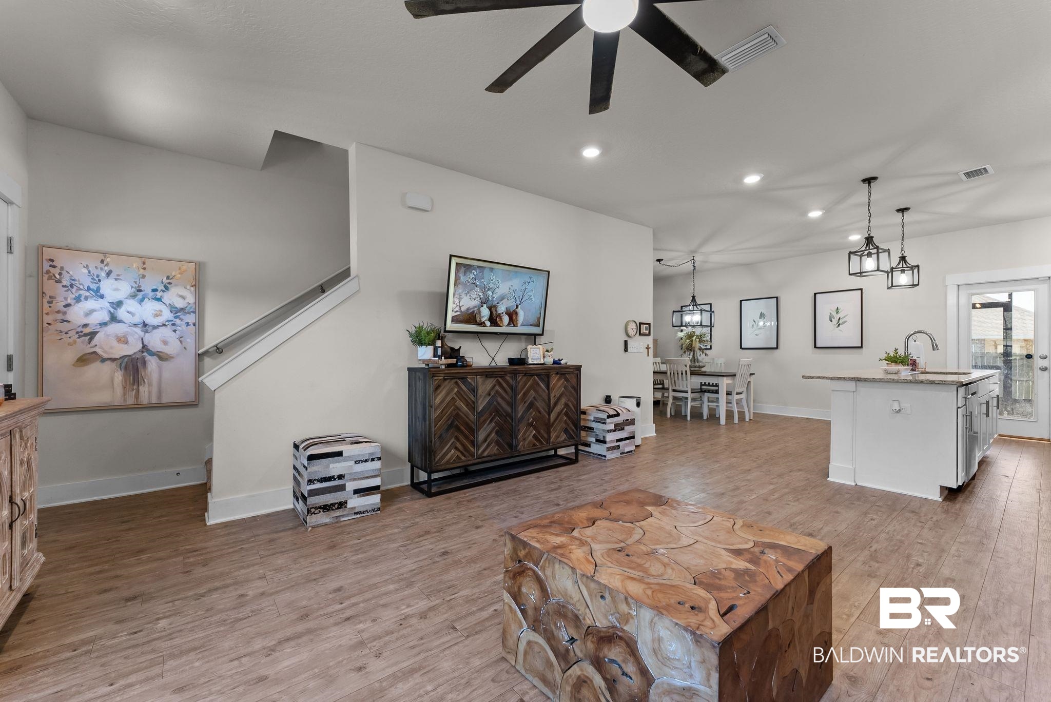 16607 Prado Loop Loxley, AL 36551 - Photo 7 of 46 Open-concept living space featuring wood-finish flooring, recessed lighting, and a contemporary ceiling fan