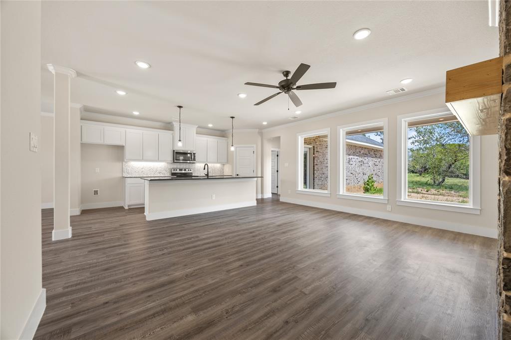 Lot 5 Slate Rock Road Ennis, TX 75119 - Photo 14 of 22 a view of kitchen with wooden floor and window