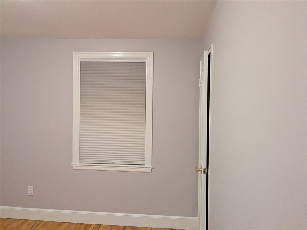 33 Paragon Road, Unit 1 Boston, MA 02132 - Photo 11 of 18 a view of a small space with a window