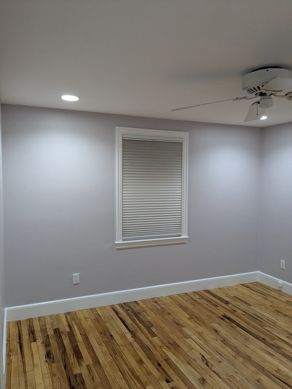 33 Paragon Road, Unit 1 Boston, MA 02132 - Photo 9 of 18 a view of an empty room with a window