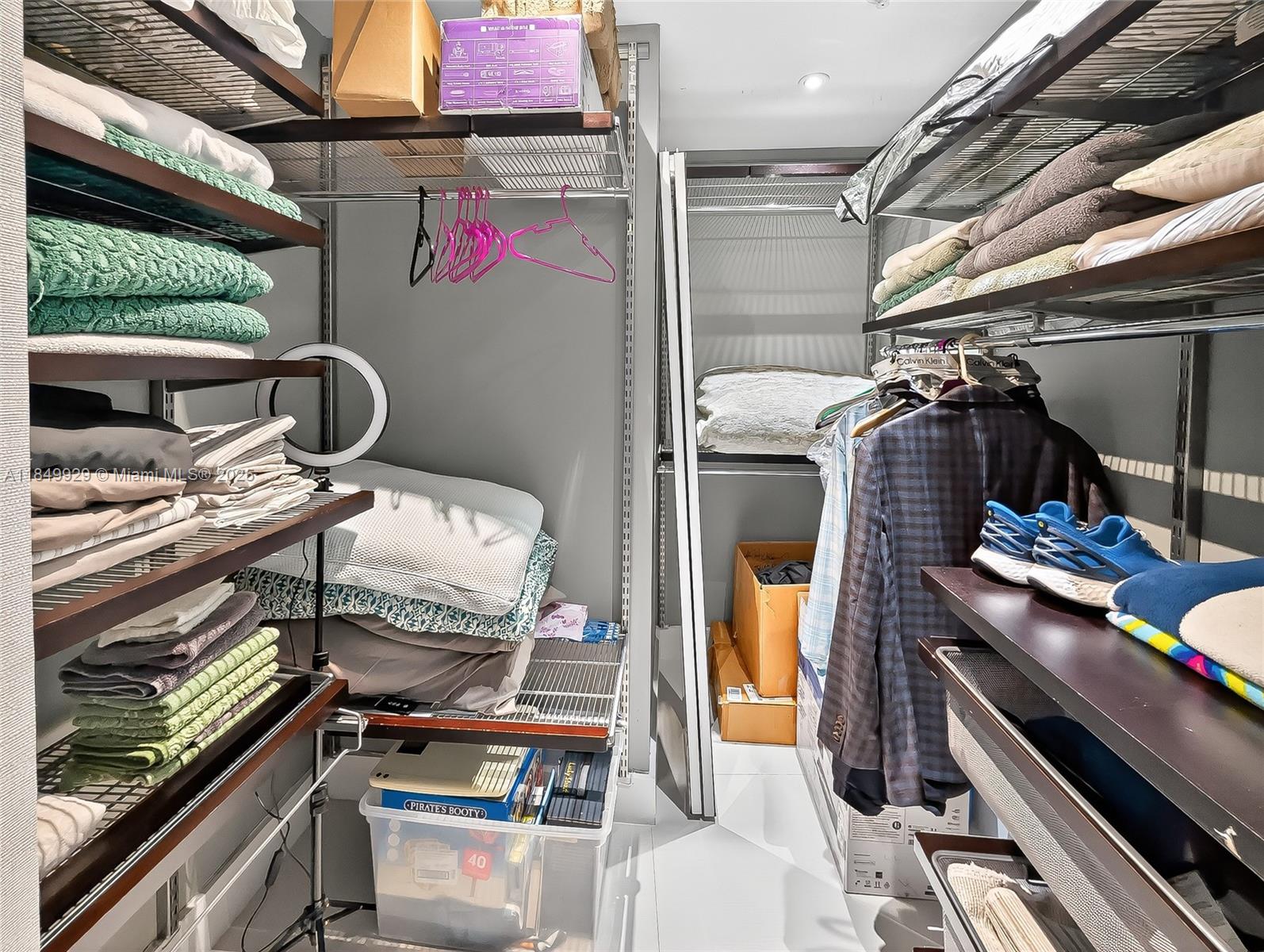 601 Northeast 36th Street, Unit 2201 Miami, FL 33137 - Photo 17 of 42 a utility room with dryer and washer