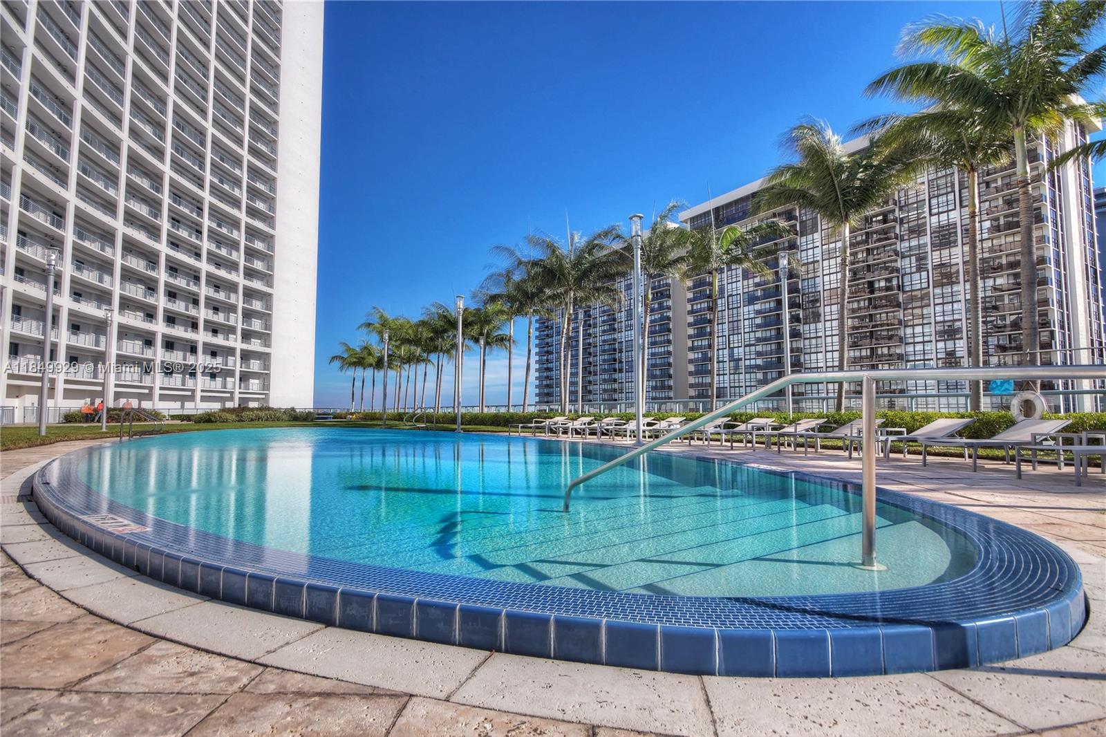 601 Northeast 36th Street, Unit 2201 Miami, FL 33137 - Photo 23 of 42 a view of swimming pool with outdoor seating