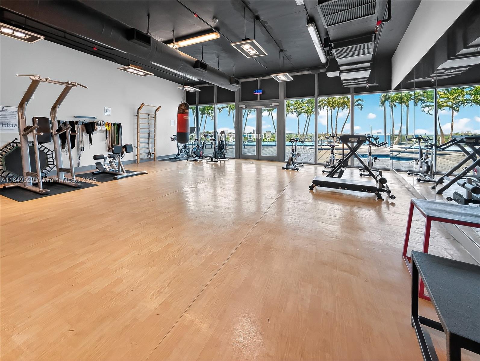 601 Northeast 36th Street, Unit 2201 Miami, FL 33137 - Photo 30 of 42 a view of a studio with wooden floor