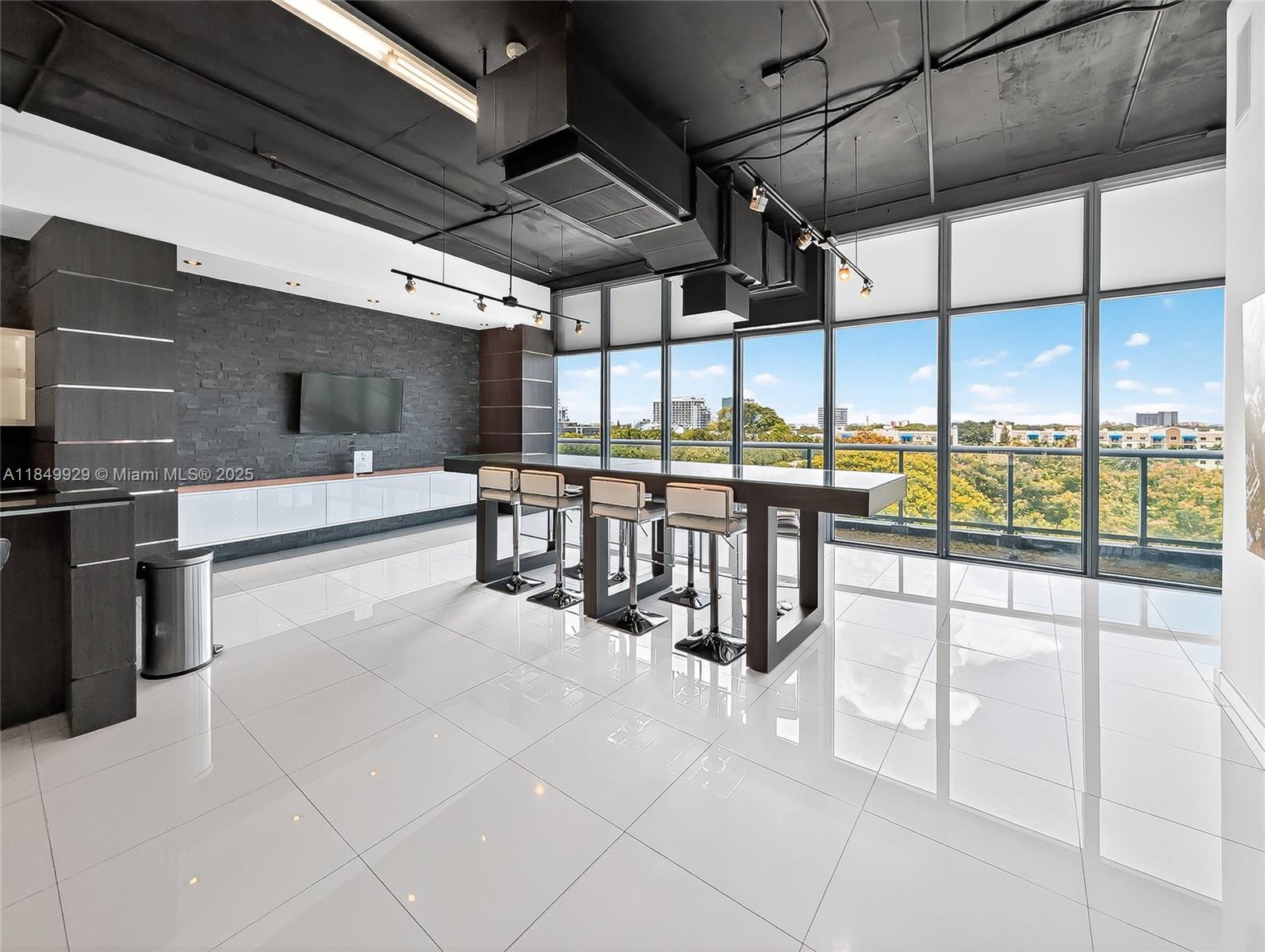 601 Northeast 36th Street, Unit 2201 Miami, FL 33137 - Photo 36 of 42 a view of a hall with an empty room