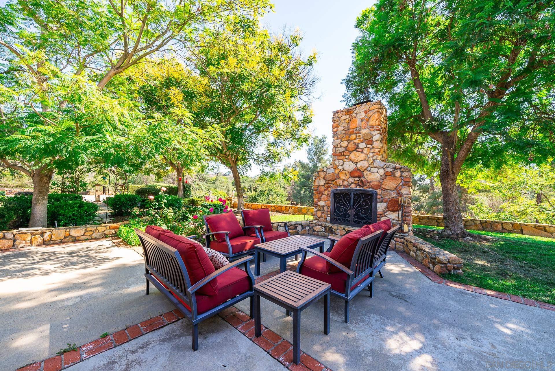 14574 Millas Road Poway, CA 92064 - Photo 54 of 75 a view of a patio with chairs and a table