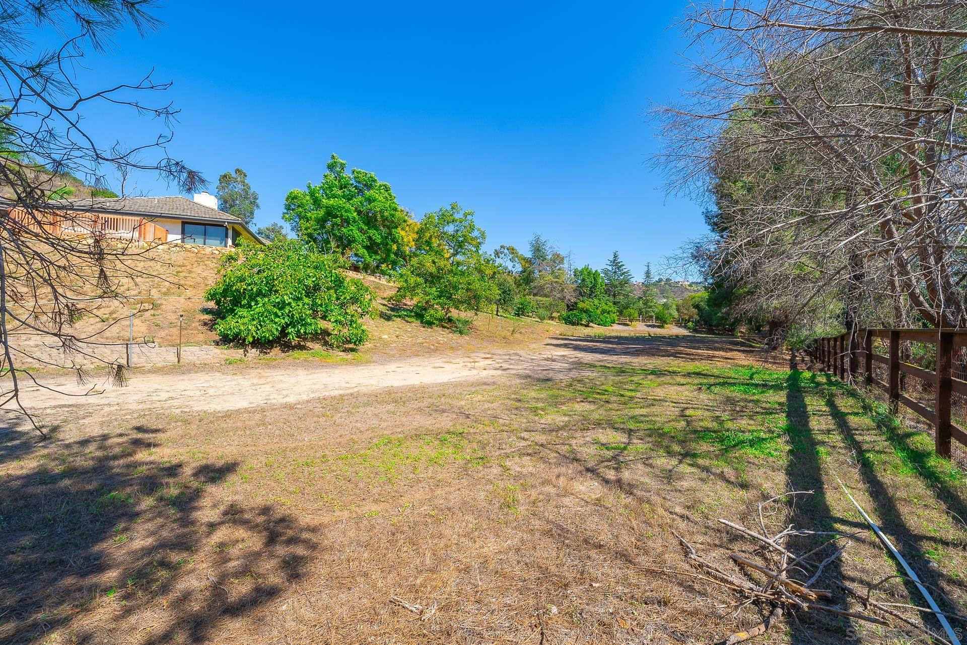 14574 Millas Road Poway, CA 92064 - Photo 58 of 75 a view of a yard with a tree