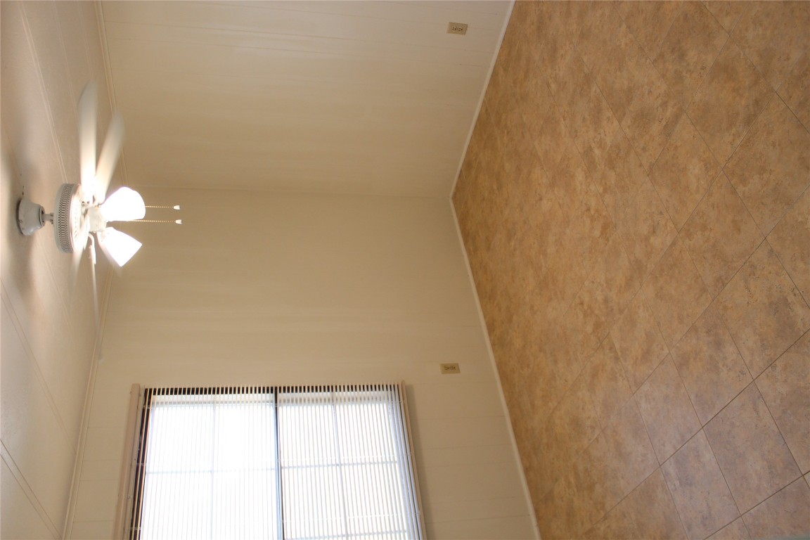 14111 South Green Hills Loop, Unit B Austin, TX 78737 - Photo 7 of 13 a view of empty room with window