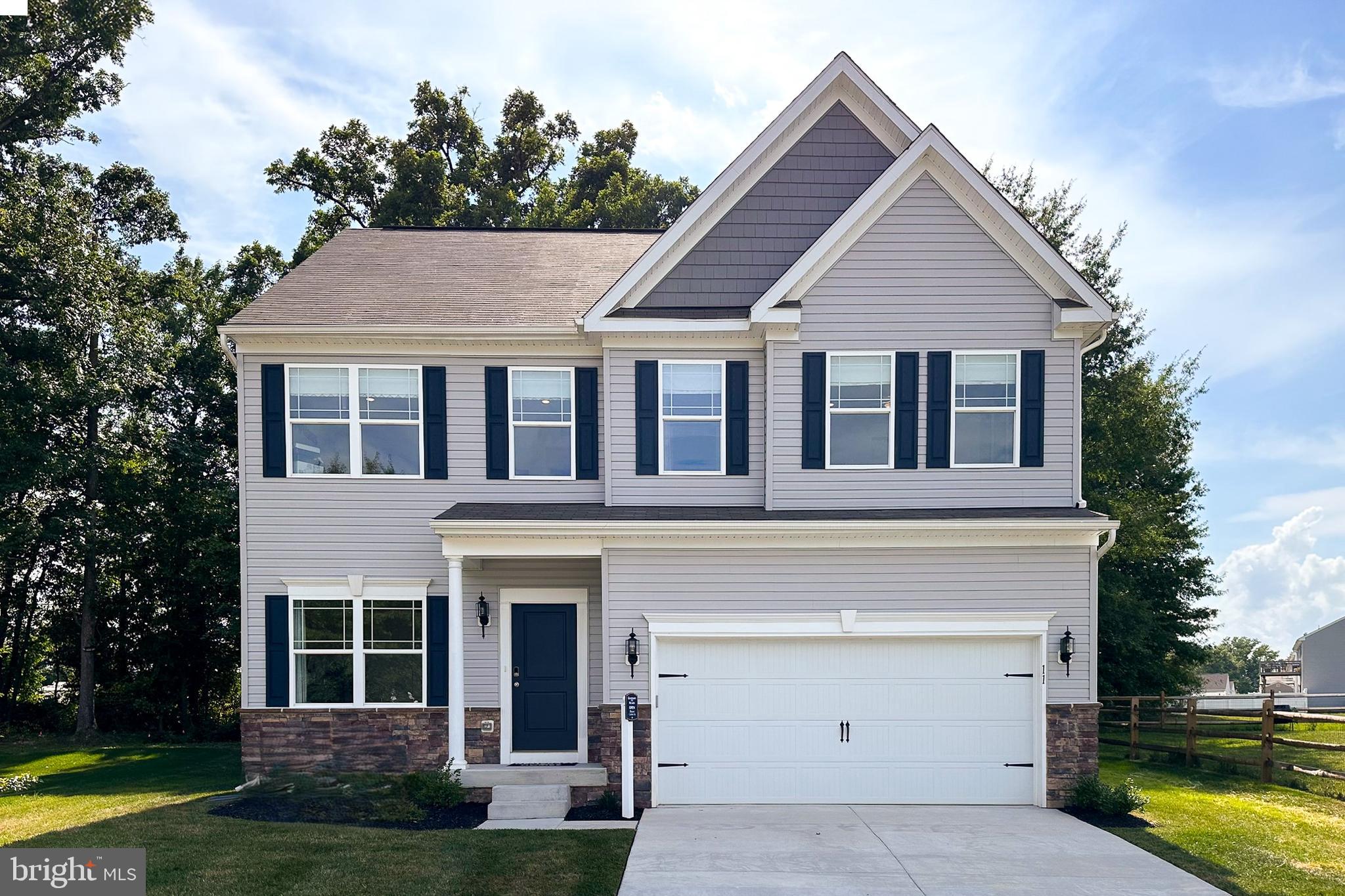 11 Red Cloud Loop Elkton, MD 21921 - Photo 1 of 2 a front view of a house with garden