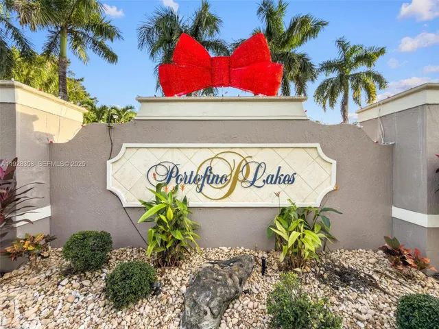 a sign that is on a brick wall