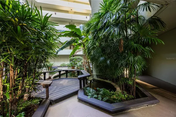 a view of a building with a garden