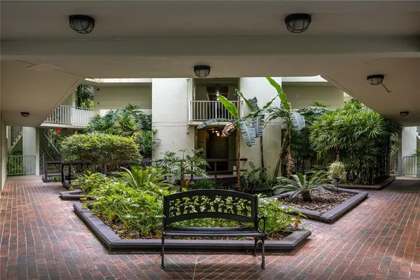 a view of a potted plants in front of a building